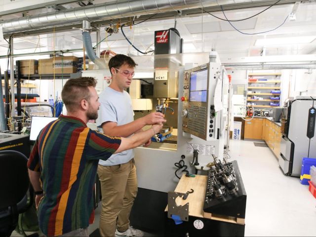 Two people working in a lab